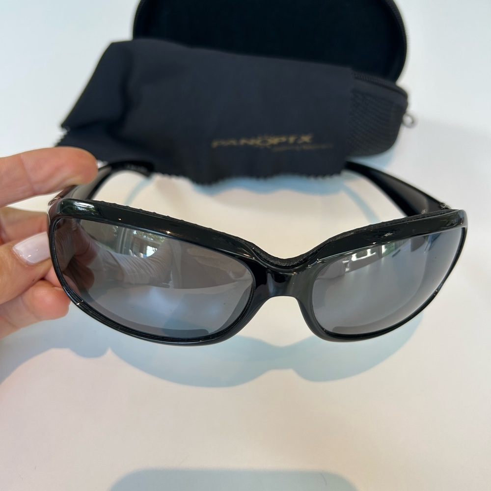 Panoptx black wrap glasses.